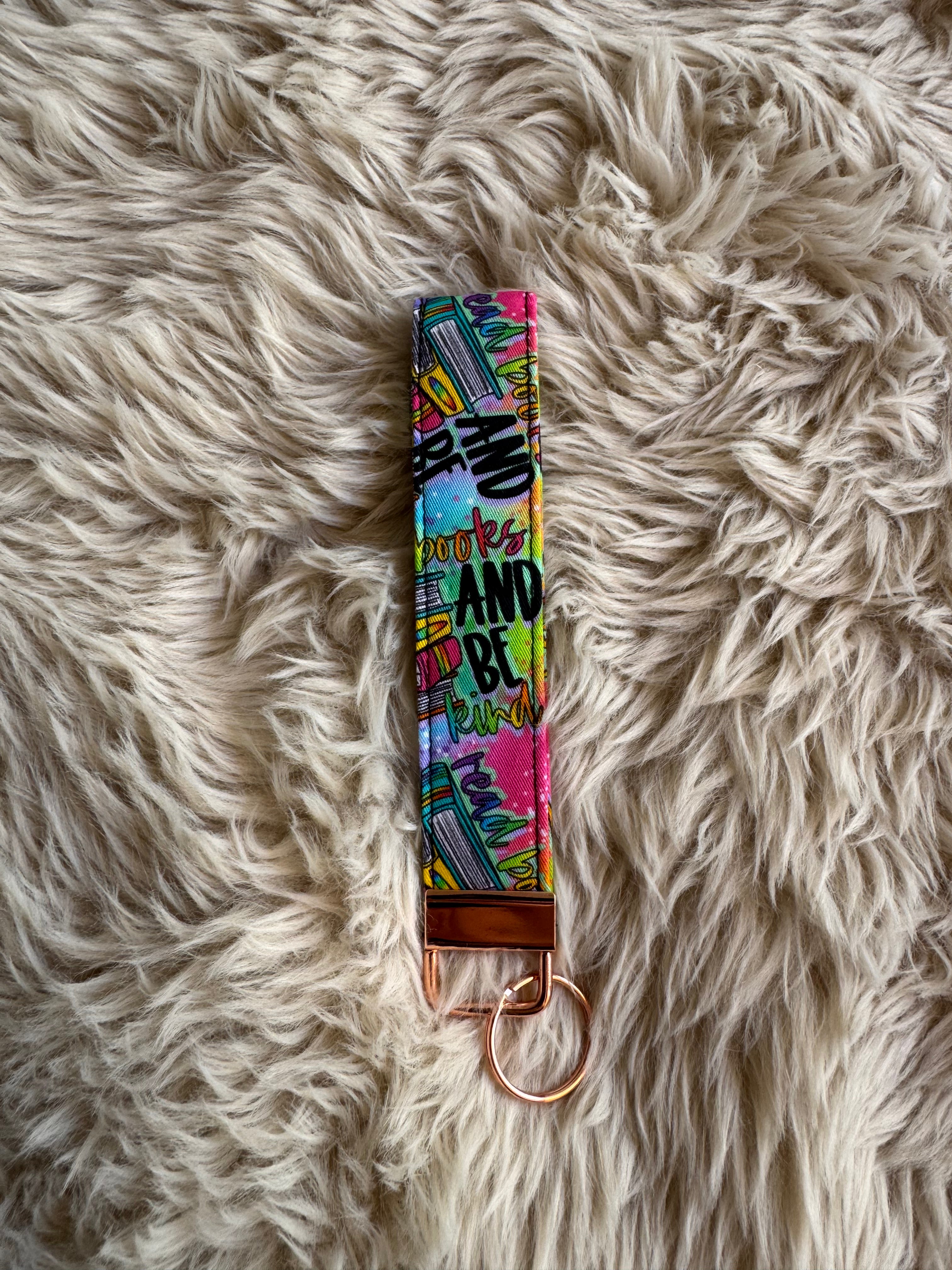 Read books and be kind Wristlet
